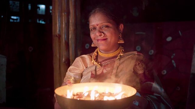 Portrait of a beautiful young Indian woman celebrating Diwali, the Festival of Lights,