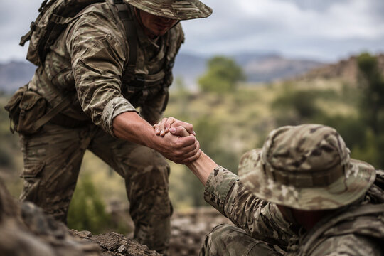 Military Soldier Reaching Out to Help a Comrade Up a Rocky Terrain. Concept of Teamwork, Support, Brotherhood, and the "Leave No Man Behind" Spirit During a Combat Mission.