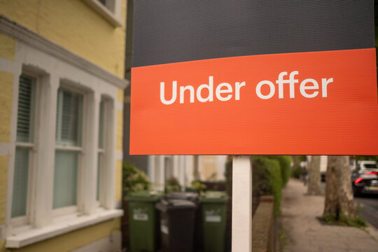 LONDON - under offer estate agent sign on residential street