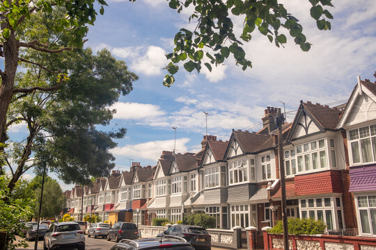 LONDON - row of terraced houses with large blue sky and copy space