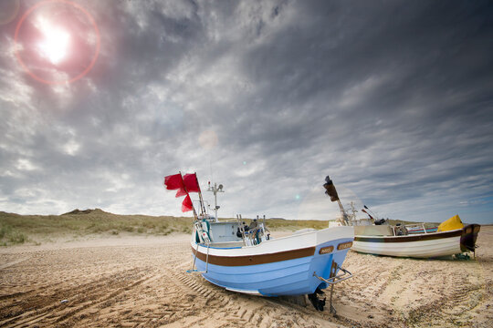 Fishing boats on Stenbjerg beach, Denmark
