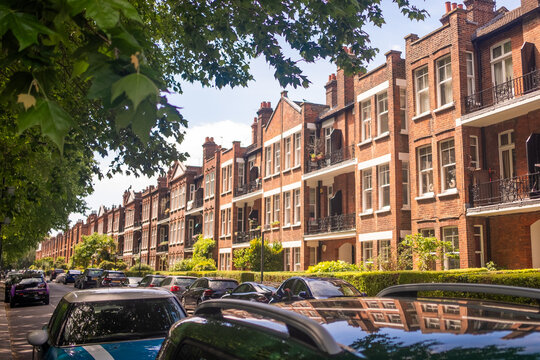 LONDON - upmarket red brick mansion blocks on residential street in Fulham