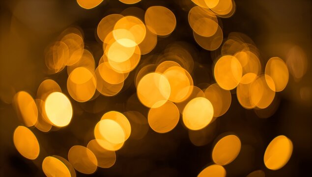 Soft, glowing orbs of golden light create a dreamy, bokeh effect. The warm, ethereal background suggests a celebratory or magical atmosphere