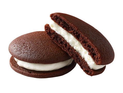 Classic chocolate whoopie pies with creamy vanilla filling, including one cut open to reveal the soft cake-like interior, isolated on white.