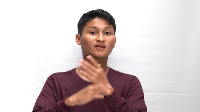 Young Man Raising Both Hands Asking Why