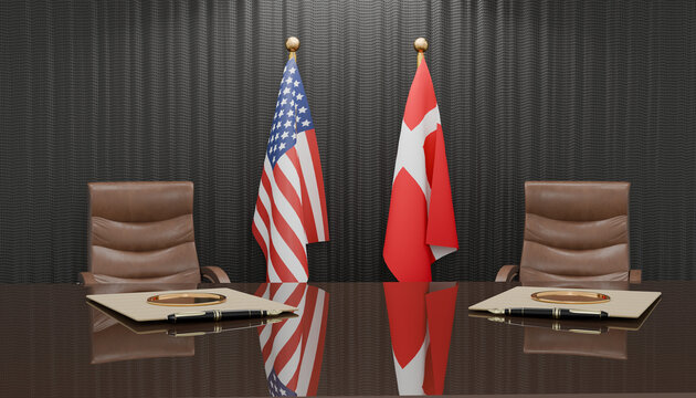 Diplomatic Meeting Table: Two chairs face a polished table, adorned with the flags of the United States and Denmark, symbolizing international relations and diplomatic discussions in a formal setting.