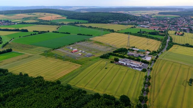 Aerial Video of Power Substation, Farmland and Rural Town