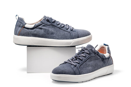 Blue Canvas Sneakers. Sport shoes isolated on white background, clipping path included