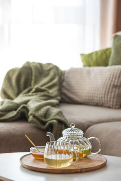 Cozy home living room with hot tea and honey