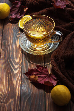 Warm lemon tea preparing for an autumn day