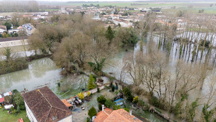 Naklejka premium Aerial View of Flooded Village and Countryside