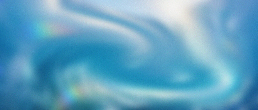 Prismatic light refracts through a dreamlike expanse of diffused glacial blue and tranquil cyan currents, revealing a soft, granulated, ethereal