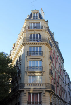 Facade of a traditional apartment building in Paris, France