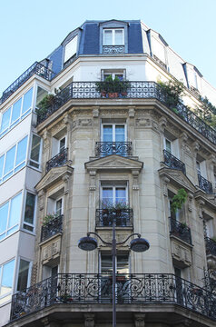 Facade of a traditional apartment building in Paris, France