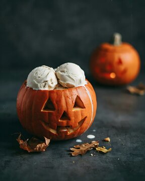 Festive halloween pumpkin ice cream a spooky sweet treat for autumn celebrations and fall dessert displays