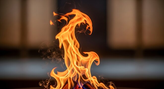 A mesmerizing close up shot of flickering orange flames rising from burning wooden logs in a dark fireplace creating a warm and comforting indoor atmosphere