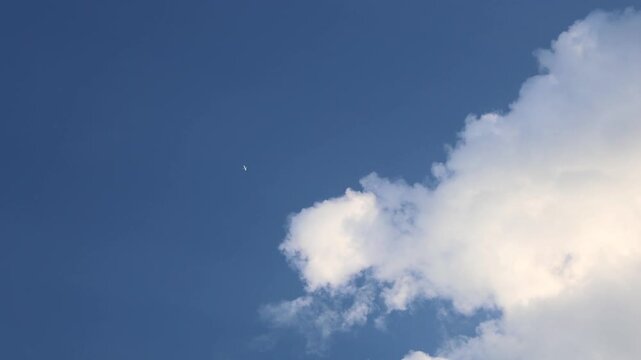 White Clouds Drifting Across Bright Blue Sky 180fps Captured in Cinematic High Detail Footage