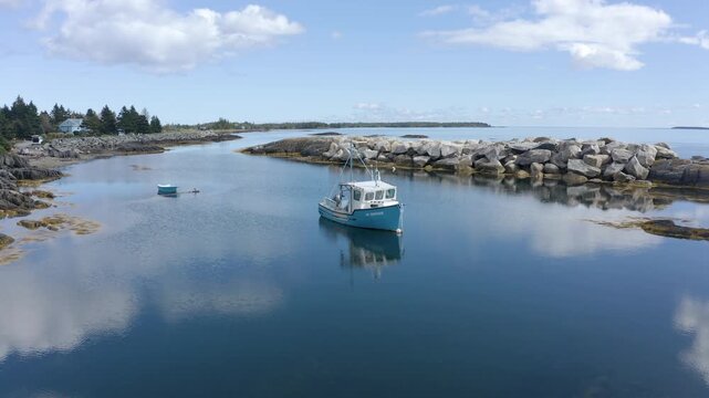 Fishing Boat in Calm Harbor at Blue Rocks, Nova Scotia, Canada