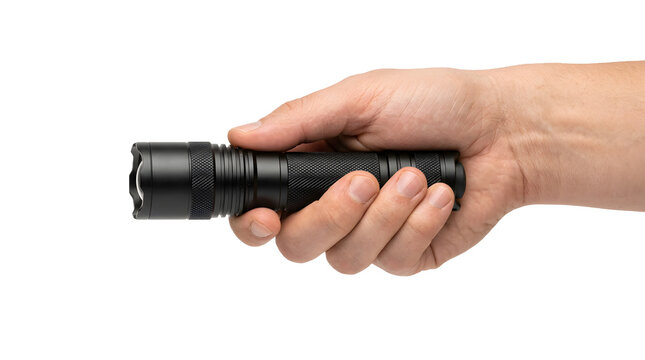 Hand holding a black flashlight for the concept of emergency preparedness and exploration.