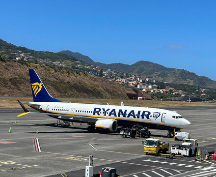 Airplane Ryanair Boeing 737-800 at the airport. Close-up. Funchal. Madeira. Portugal.