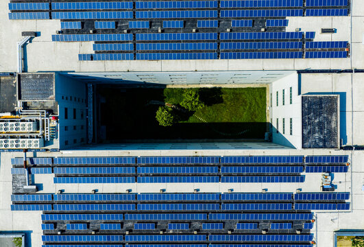 solar panels covering factory rooftop