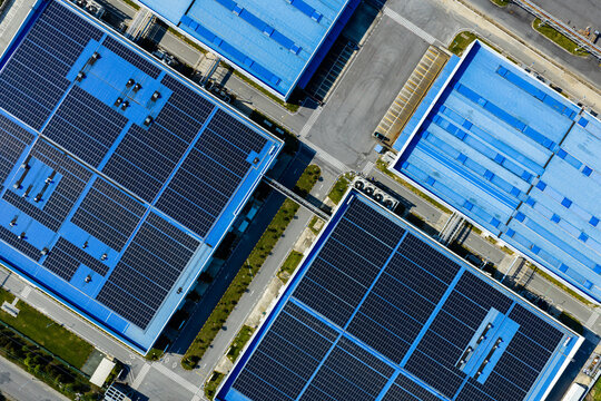 solar panels covering factory rooftop