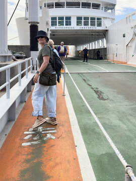 Person Walks on Ferry Deck at Nasohima Art Island, Japan