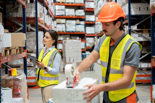 Warehouse workers managing inventory and shipping logistics