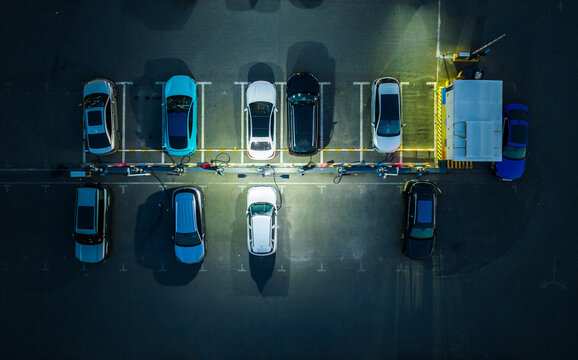  electric vehicles charging at night station