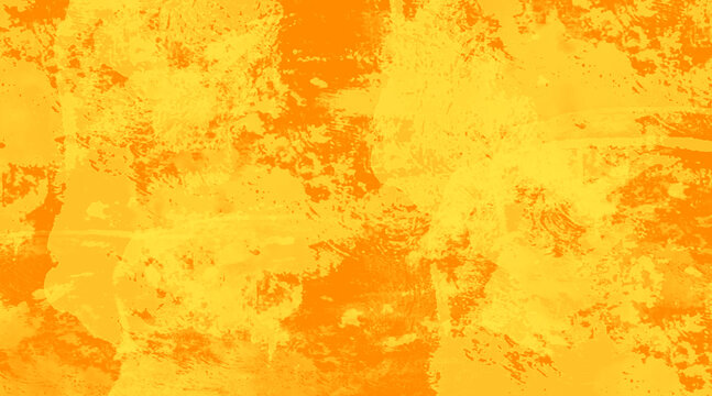 Abstract yellow and orange grunge texture background with paint splatter effect