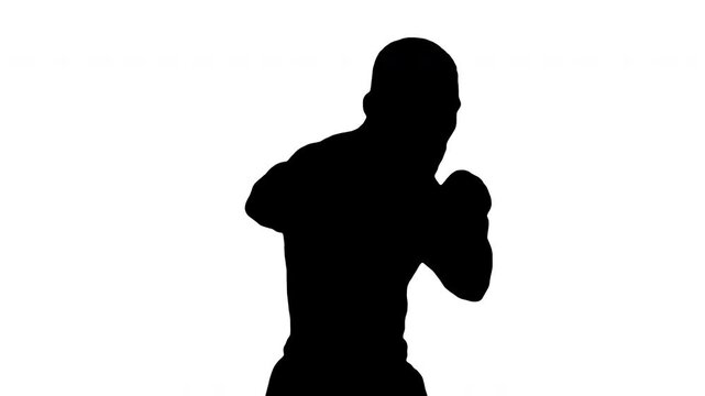 Black silhouette man boxing on white background. Black and white for composite and presentation. Alpha matte isolated.