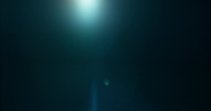 Slow motion cinematic lens flare and light leak effect isolated on black background. Perfect overlay for VFX, transitions, title reveals, film burn style and glow highlights.