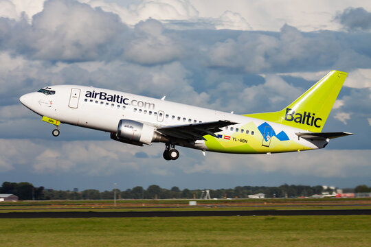 Air Baltic Boeing 737-500 (LY-BBN) taking off from Amsterdam Schiphol Airport on August 15, 2014 in Amsterdam, Netherlands