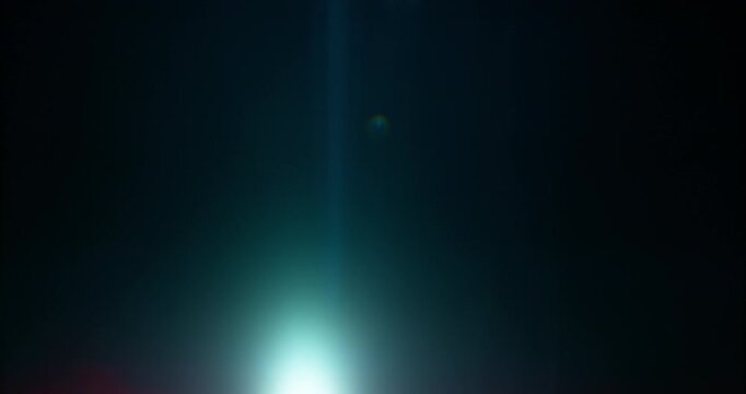Slow motion cinematic lens flare and light leak effect isolated on black background. Perfect overlay for VFX, transitions, title reveals, film burn style and glow highlights.
