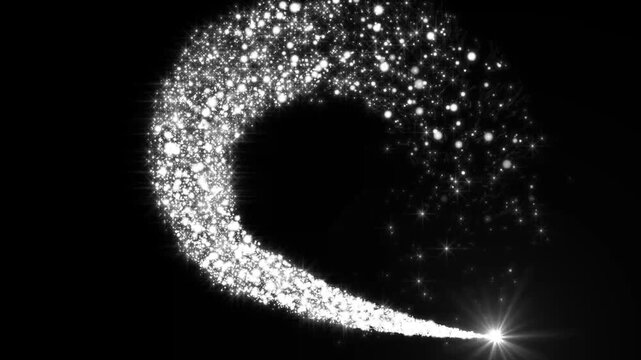 White glittering particle trail spinning to draw a luminous magical circle on black background