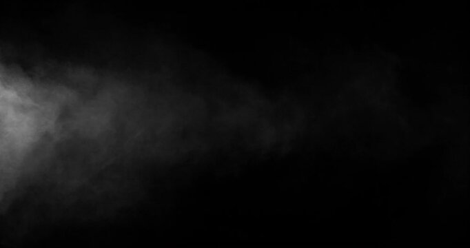Detailed slow motion rising smoke isolated on black background. Cinematic fog overlay with soft swirling motion, ideal for VFX compositing, transitions and atmosphere.