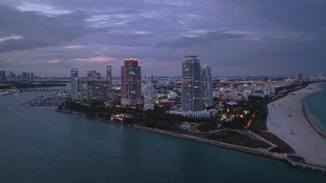 Landscape aerial Miami skyscraper architecture. Luxury skyscraper in evening Florida. Miami south beach aerial view at night. Landscape Miami south beach, night city. Aerial view on south pointe park