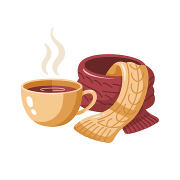 Warm cup of coffee or tea with steam and a folded red knitted scarf for autumn and winter seasonal comfort concept