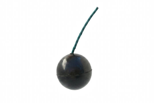 Spherical explosive device with a long green fuse
