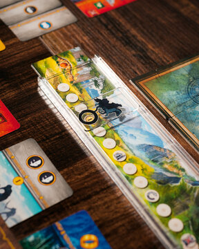 Portrait macro product photography of Lord of the Rings Duel Middle Earth showing ring hunt gameplay representation designed by Antoine Bauza and Bruno Cathala