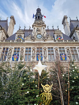 Paris, France - December 10, 2025: Hotel de Ville in Paris during the winter holidays decorated with Christmas trees and festive lights