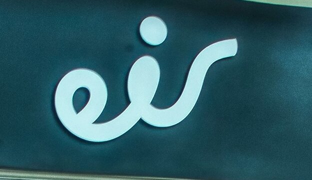 close up photo of an eir sign on a store..Eircom Limited, trading as Eir is a large fixed, mobile and broadband telecommunications company in Ireland