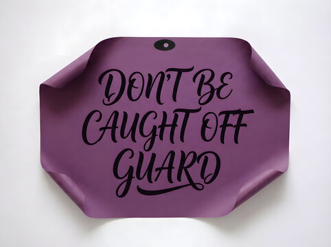Don't Be Caught Off Guard Inspirational Typography On Deep Purple Hanging Paper Tag Isolated On White Background For Awareness, Preparation, Risk Management And Personal Growth Concept