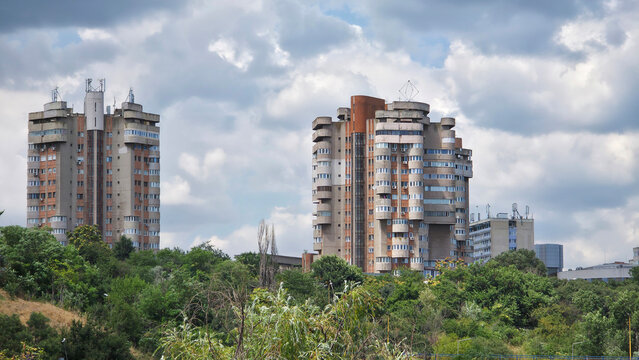 Brutalist apartment blocks in Chisinau surrounded by greenery