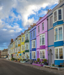 Obraz premium Row houses along the seafront of the resort city of Weymouth, Dorset, Southern England