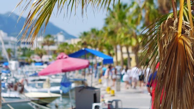 A busy harbor area in Kos island with people and boats in slow motion 60fps