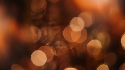Fototapeta premium Abstract background with soft golden bokeh lights, festive holiday atmosphere, blurred warm glowing circles, elegant light effect