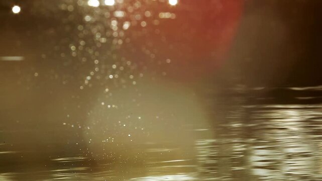 Reflection of sunset in water for natural background with glow and glitter