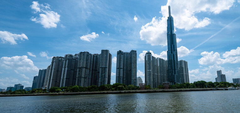 Landmark 81 supertall skyscraper and Ho Chi Minh City waterfront skyline photographed from across the Saigon River, Vietnam
