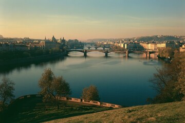 Obraz premium Evening panorama of Pragueâ€™s river bridges along the Vltava from LetnÃ¡ Park viewpoint